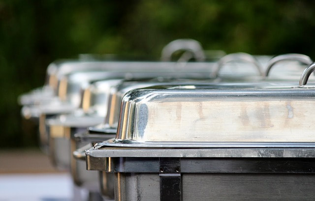 Chafing dishes at a catered buffet.