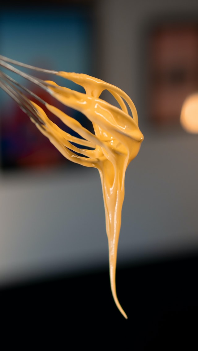 Spicy mayonnaise on a whisk